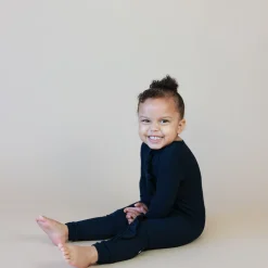 Ribbed Ruffle Zipper Romper in Midnight